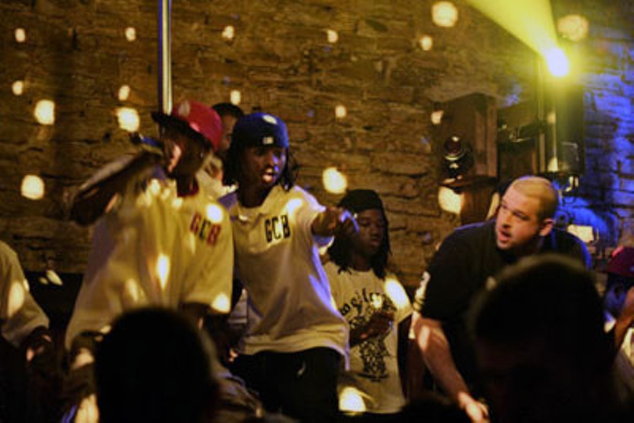 Shorty Da Kid and members of his G.C.B. crew perform while hype man K-Rock assists.