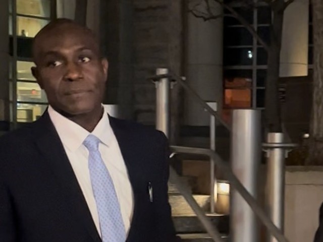 Lewis Reed outside the federal courthouse after being sentenced to 45 months in prison.