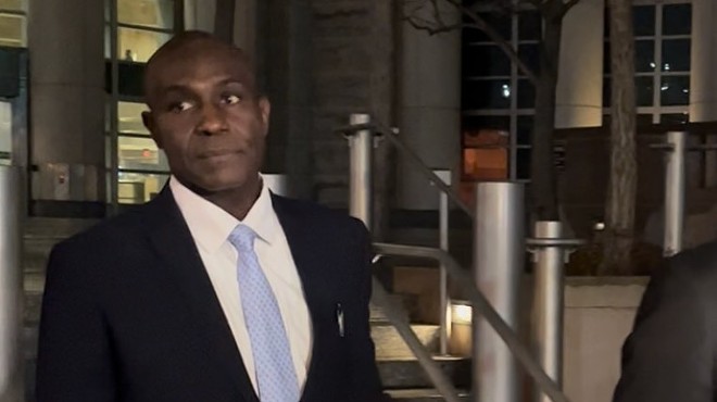Lewis Reed outside the federal courthouse after being sentenced to 45 months in prison.
