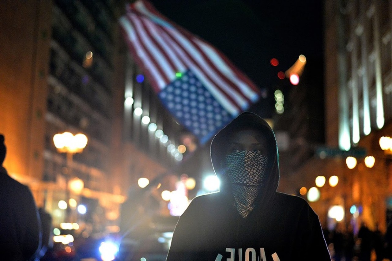 Demonstrators march in protests on the streets of St. Louis, Missouri on Dec. 3, 2014. Nationwide outrage and protests have erupted since a New York City grand jury has also decided not to indict a white police officer in the death of Eric Garner in Staten Island, New York on July 17, 2014 . AFP PHOTO/Michael B. Thomas.