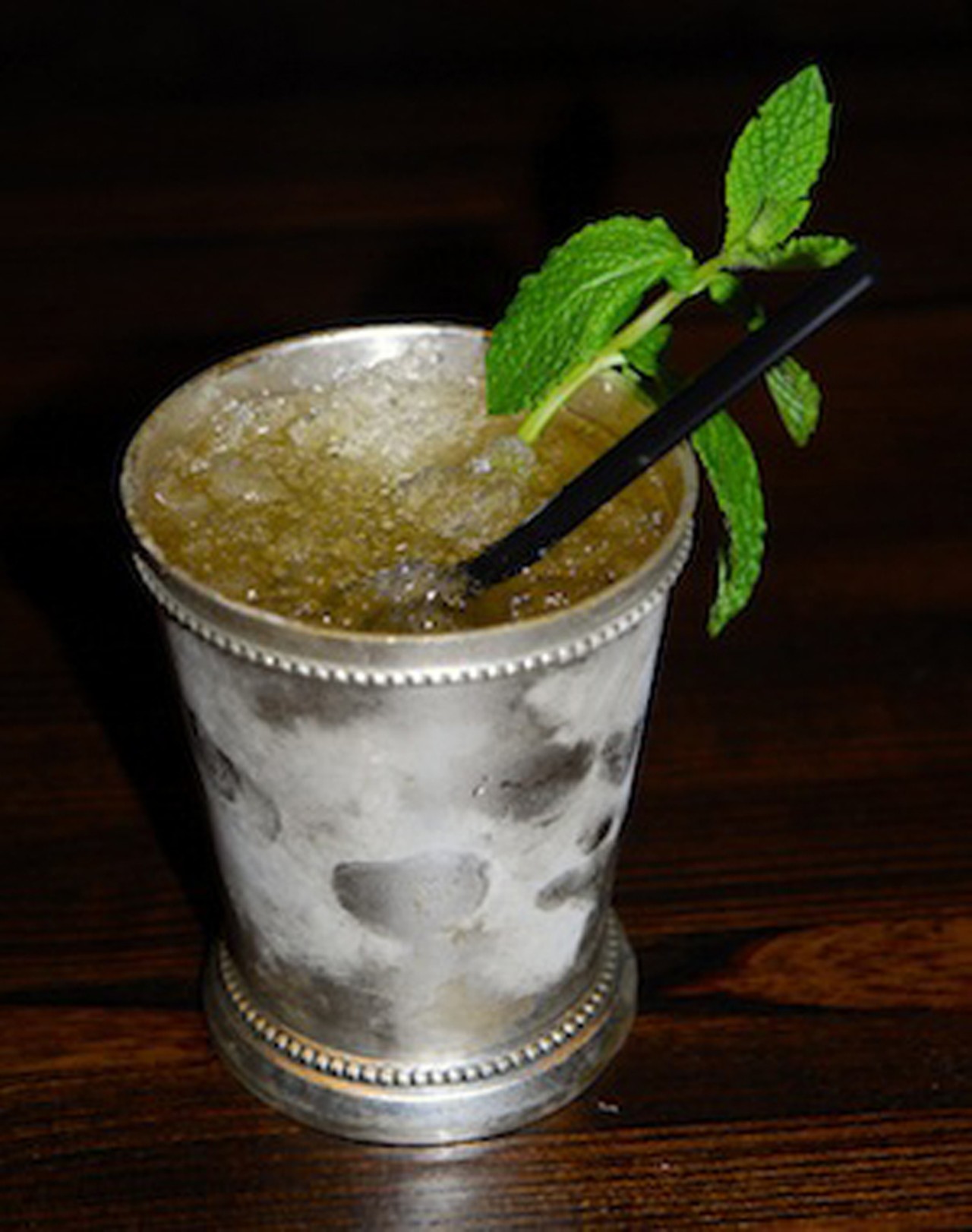 Sanctuaria's Mint Julep: Served in a chilled silver goblet, the Sanctuaria julep is worthy of a sweet Southern belle sitting on a warm Kentucky porch in May. It's not too fancy or avant garde. It's lots of mint and lots of bourbon and just the right amount of sweetness. And oh, that mint!