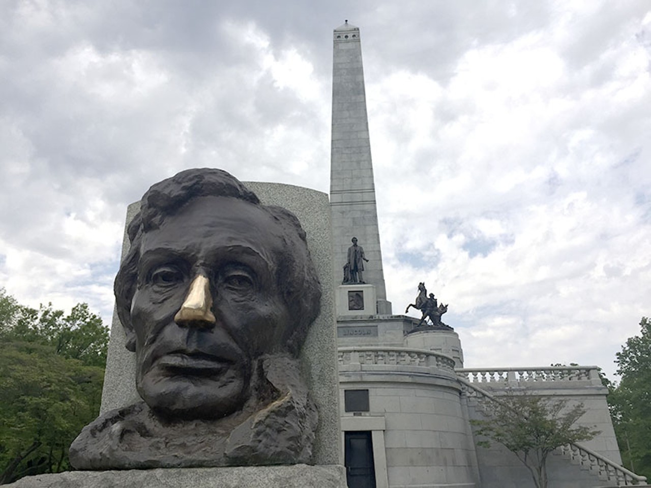 As for Lincoln's tomb, it's a quick and interesting introduction to the many remembrances in Springfield. A statue of him out front is dull bronze except for the gleaming nose, polished by the hands of thousands of visitors. A heavy door at the base of the tomb provides (free!) access to curved, marble hallways adorned with more Lincoln statues and plaques engraved with excerpts from his speeches. You eventually come to the burial chamber. Lincoln's remains lie ten feet below the floor, and his wife, Mary, and three of his boys are in crypts along the south wall. Photo by Jenna Murphy.