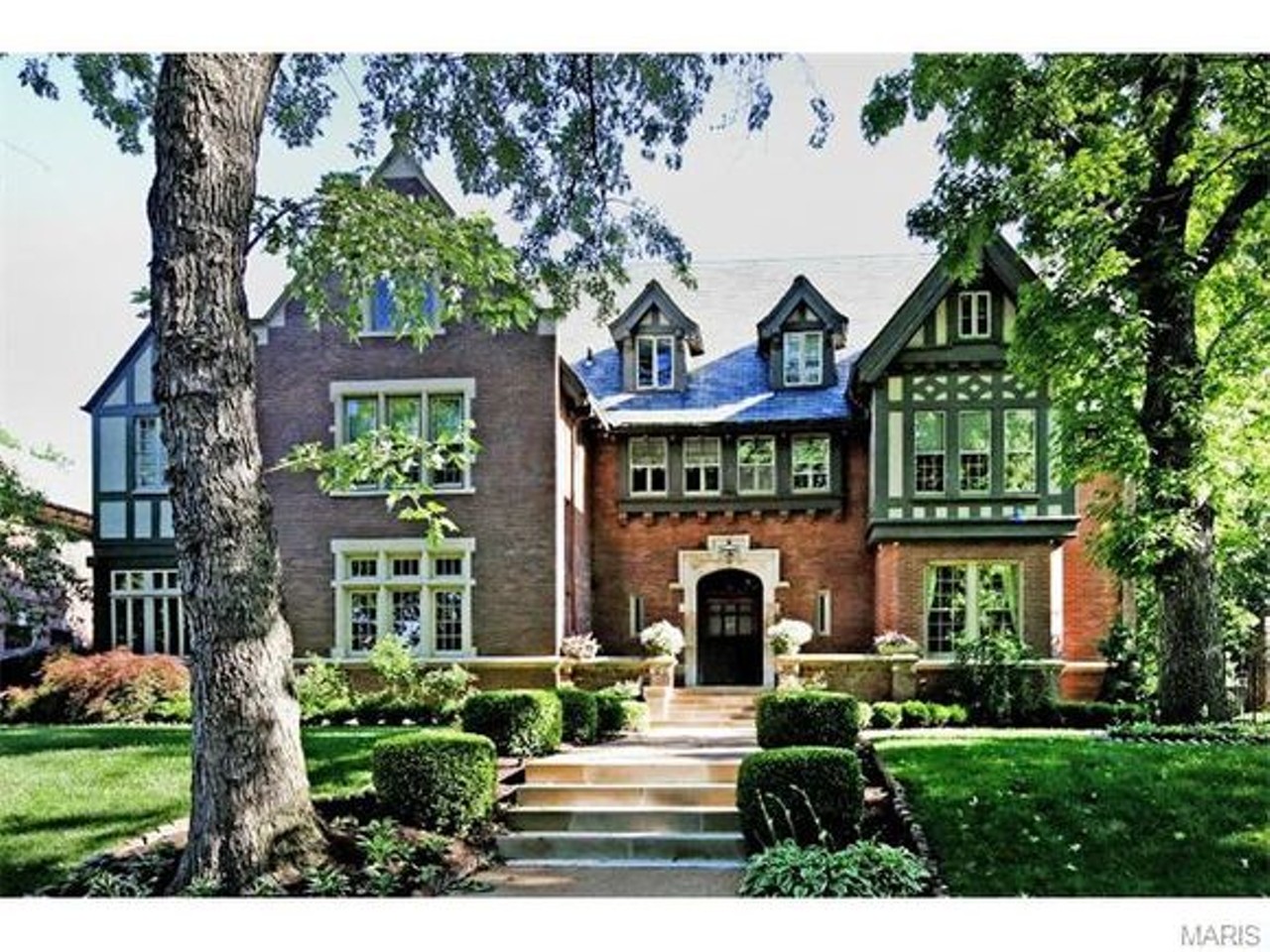 48 Portland Place in the DeBaliviere Place neighborhood has Tudor Revival charm out the yin-yang, with 7 beds, 8 baths and just under 9,000 square feet. On the market for $1,790,000.