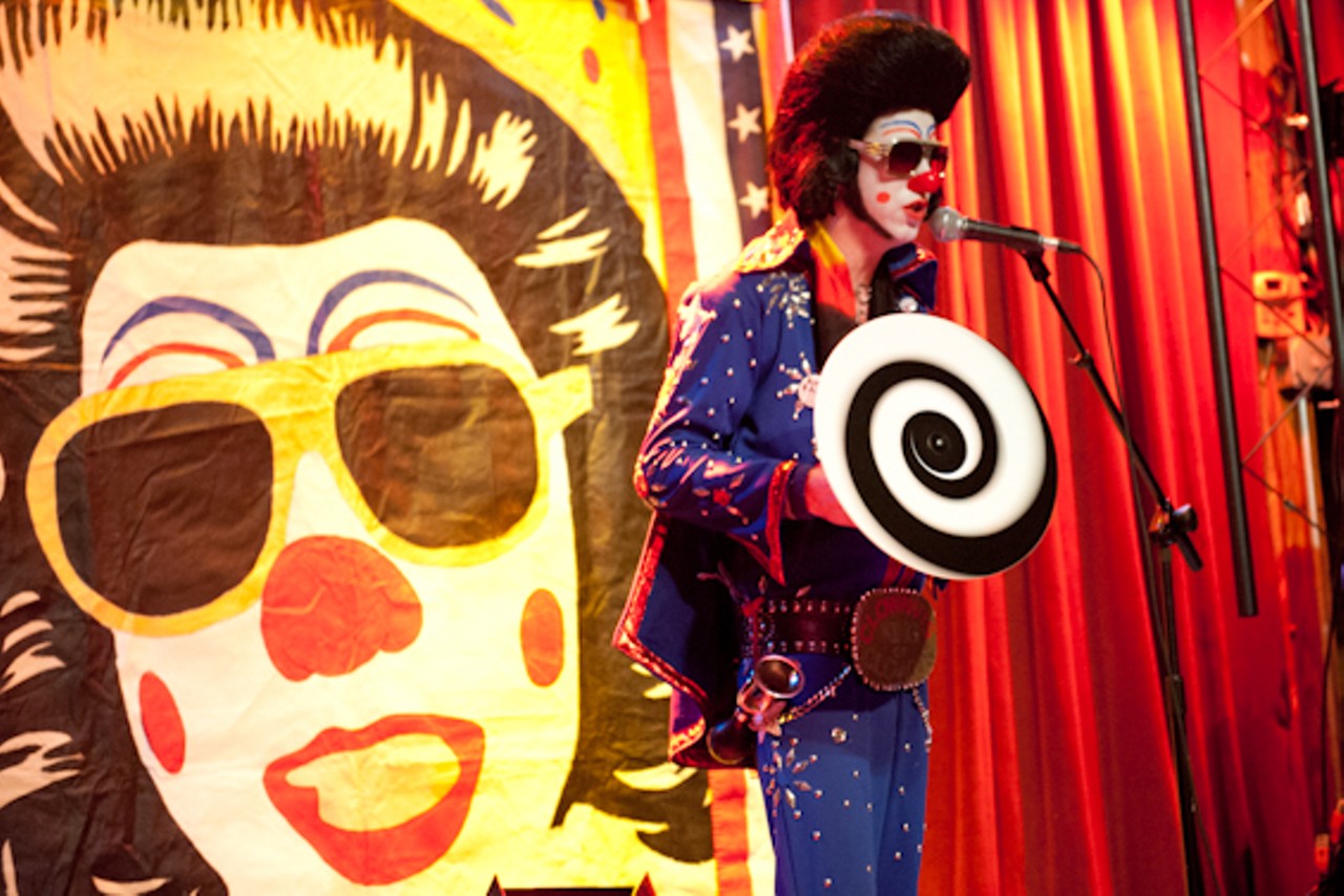 Clownvis Presley performs at Off Broadway on Christmas.