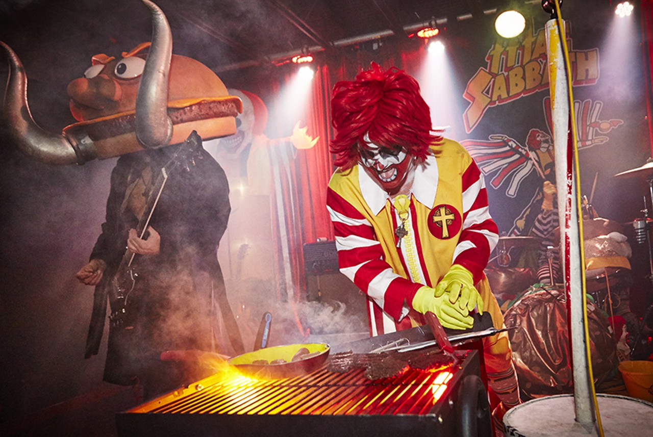 Ronald checks the grill.
