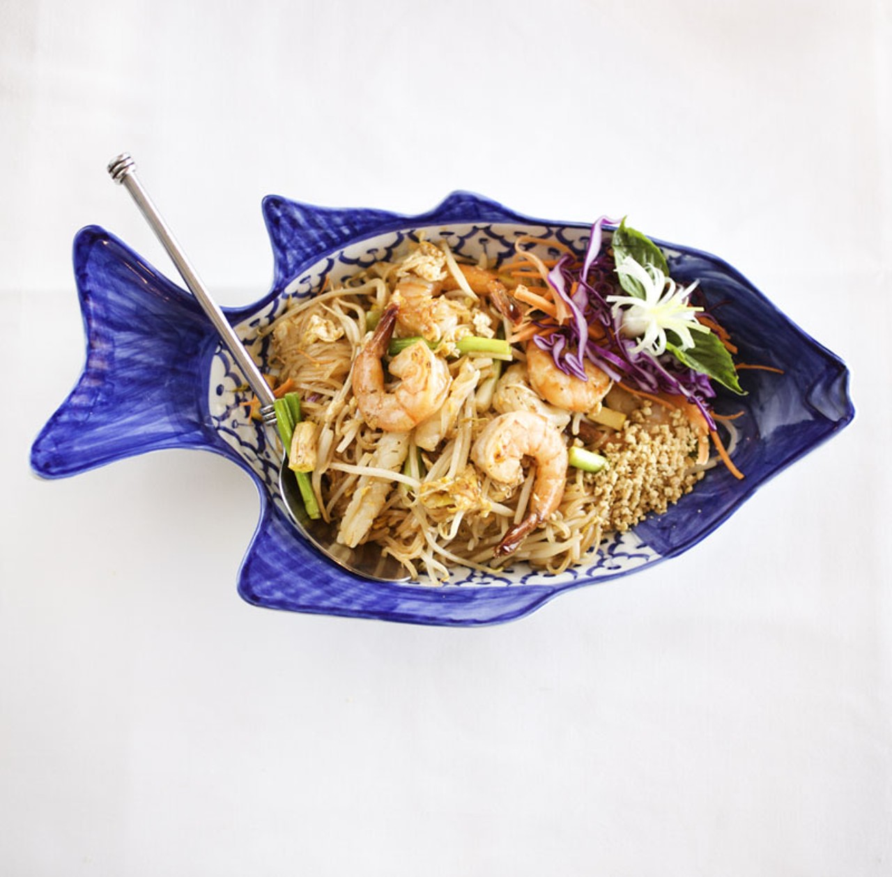Addie's Thai House offers a Pad Thai Seafood which is prepared with fried, thin rice noodles with garlic, prawns, clamari, egg, tofu, green onions, carrots and bean sprouts. The dish is then topped with ground peanuts and a slightly sweet sauce.