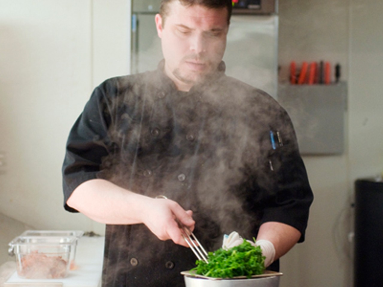 Chef Matthew Fazio with the blanched parsley. Read Ian Froeb's review: "Power Steering: Long a fixture across the river, Andria's Steakhouse opts for westward expansion."
