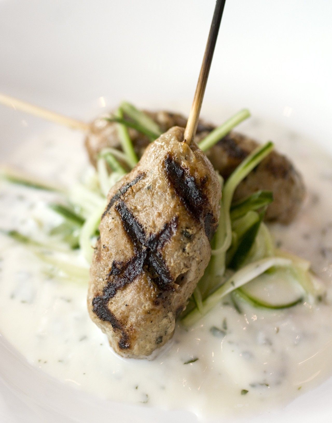 Ground Lamb Skewers with a mint scented, house-made yogurt sauce.