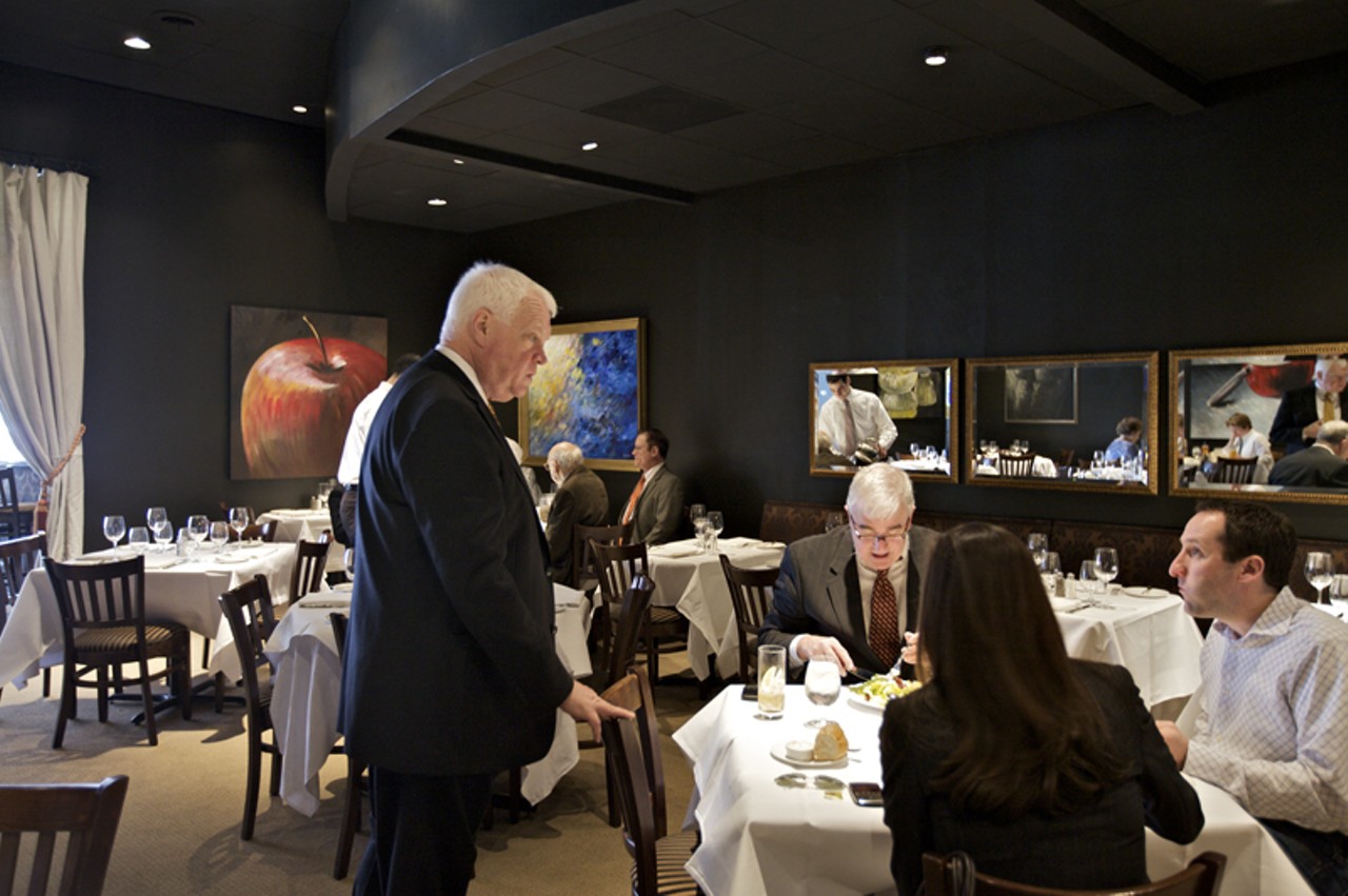 Chez Leon owner, Leon Bierbaum, checking in with his guests, making sure their dining needs are being met.