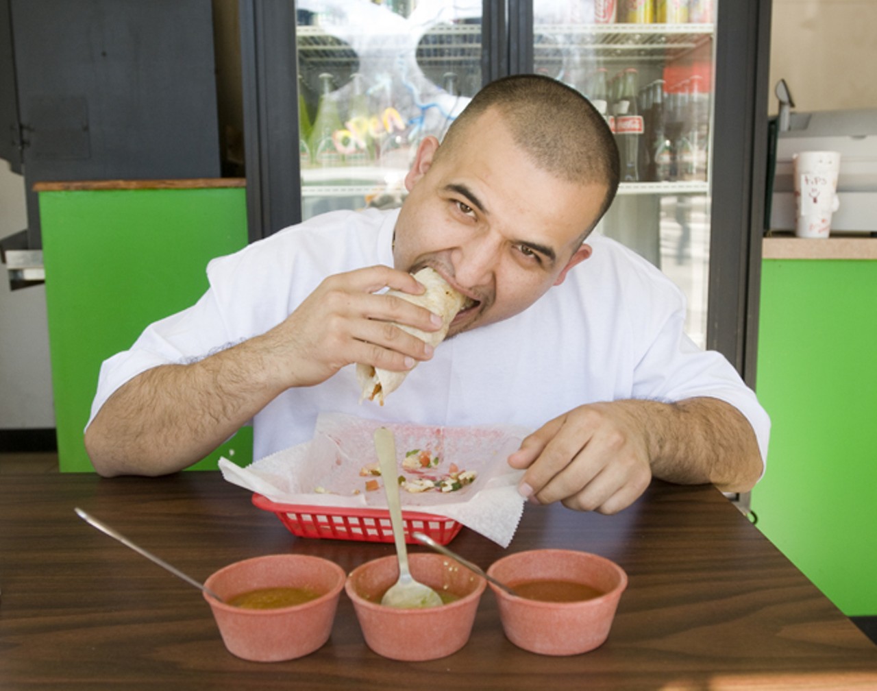 Owner Juan Villa sampling the goods.Read "Taco the Town: Taqueria el Jalape&ntilde;o scores another point for north county in the geographical battle for local Mexican restaurant supremacy" by Ian Froeb.