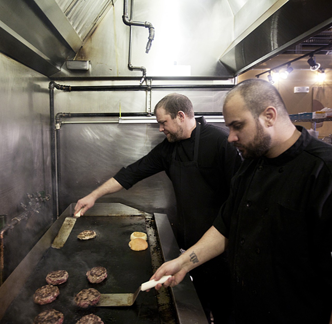 In front, Sous Chef Angel Acevedo and back, Executive Chef Peter Clark.