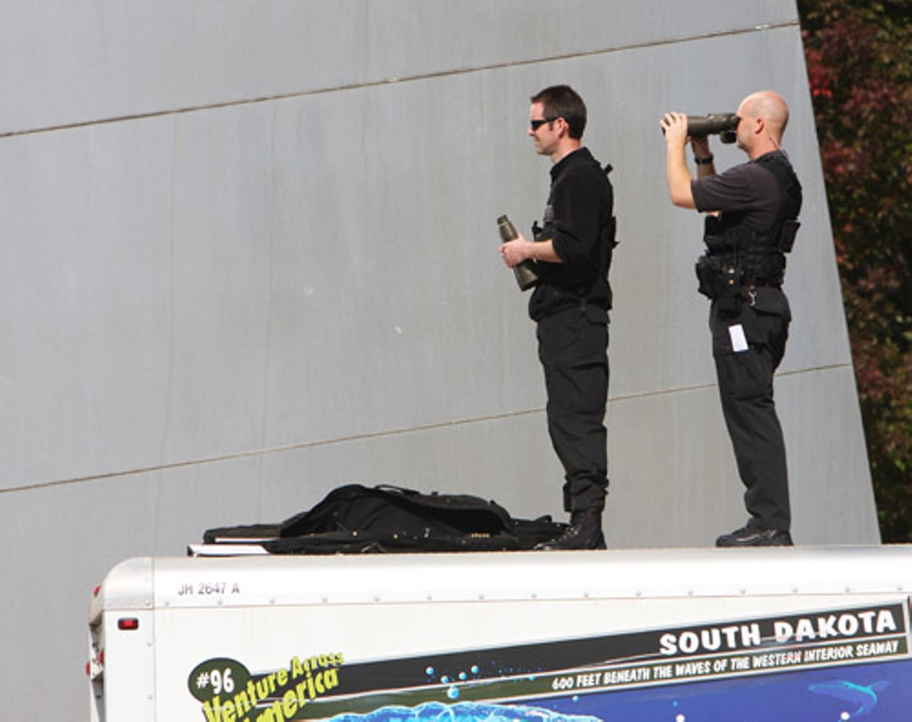The Secret Service was located throughout the Arch grounds, including on top U-Haul trucks, as seen here, to keep an eye on an estimated 100,000 faces.