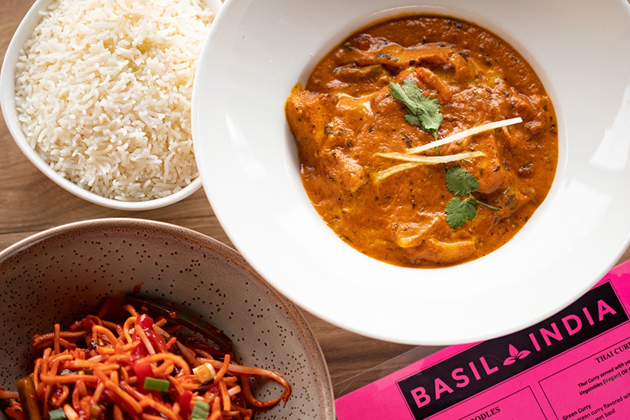 Chicken tikka masala made up of chicken simmered in a rich flavorful Indian sauce.