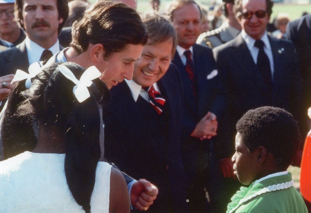 That's then-St. Louis Mayor James Conway, who served from 1977 to 1981, next to the crown prince. Sullivan recalls that the child talking to Charles was with the African American Folklore Society.