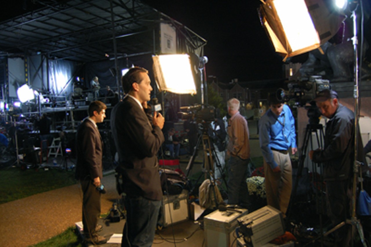 TV guys get ready for the live spot. It was a bit chilly out.