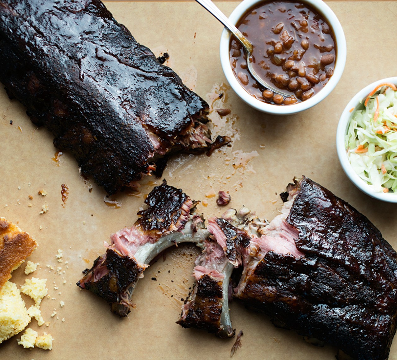 This full slab of ribs is smoked in house and served with beans, cole slaw and cornbread.
