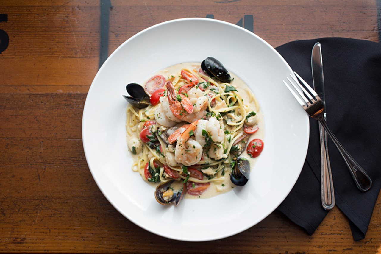 Billy G's tutto mare comes packed with shrimp, clams, mussels and bay scallops, tossed with linguine, mushrooms, grape tomatoes, and spinach with white wine and fresh garlic.