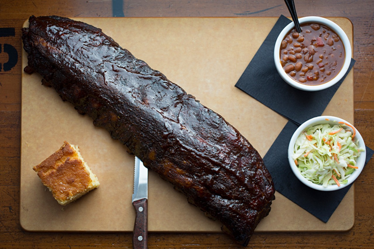 This full slab of ribs is smoked in house and served with beans, cole slaw and cornbread.