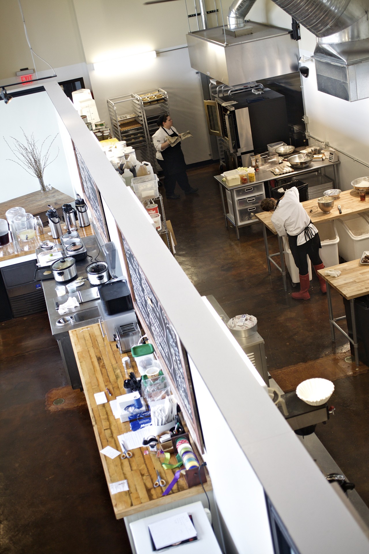 As seen from above, a half-wall divides the Sweet Boutique from the large kitchen behind it.