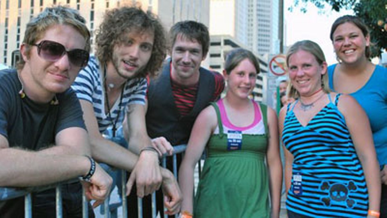 Backstage at Live OFF the Levee, with OneRepublic members Drew Brown, Brent Kutzle and Zach Filkins, posing with fans Emily, Sarah and Kimberly.