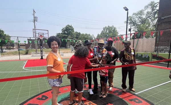 About 100 people gathered for Saturday's grand opening in the Fairground neighborhood.