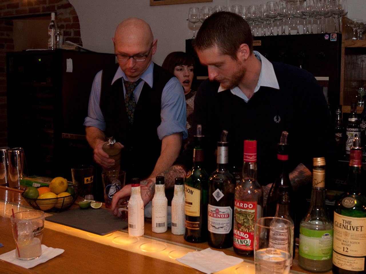 Ted Kilgore (left) of Taste by Niche and Lucas Ramsey (right) of Eclipse on Delmar, team up to create a new drink on the spot.