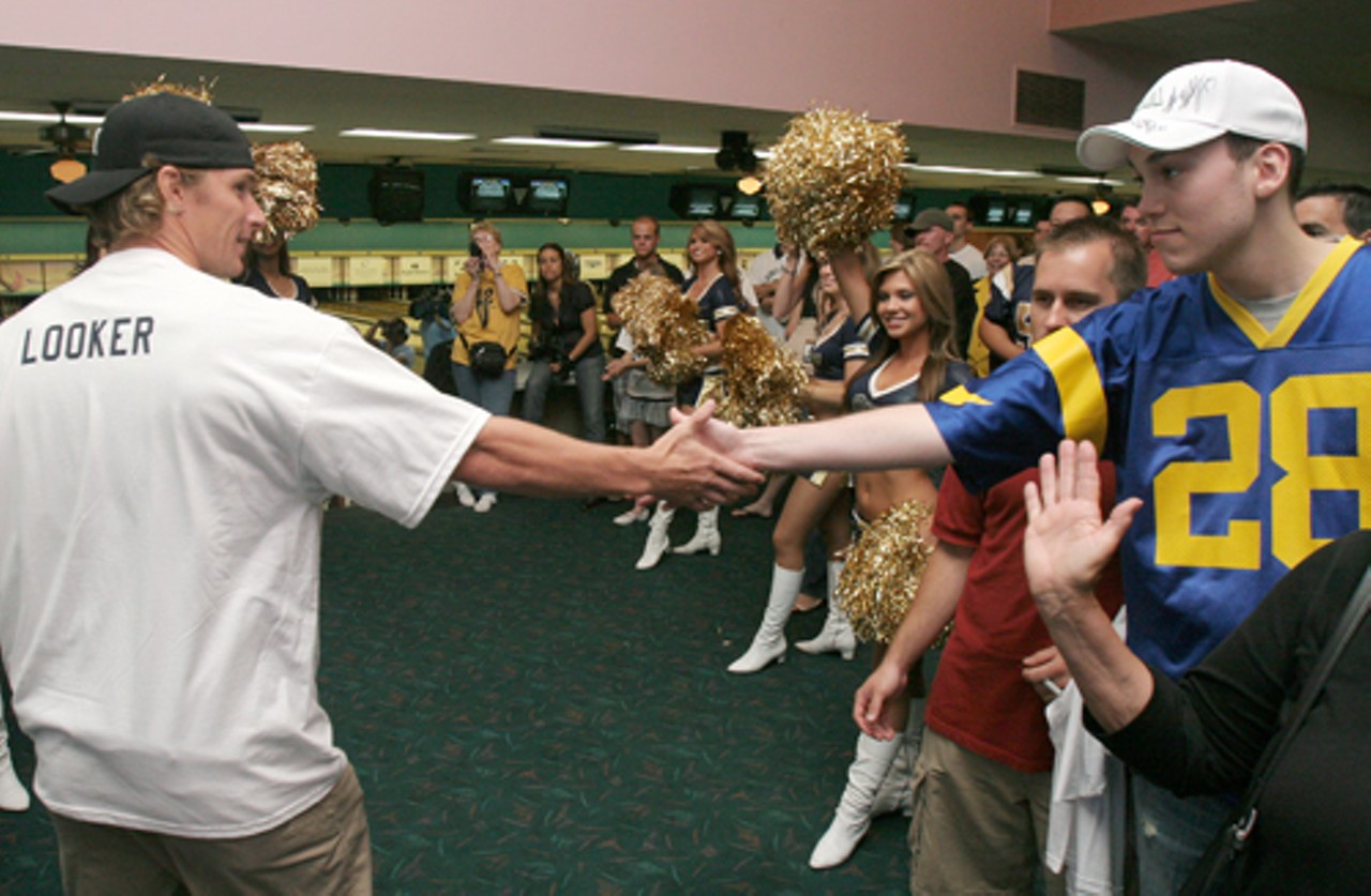 Rams wide receiver, Dane Looker, shakes Andrew Carr&rsquo;s hand while being introduced.
