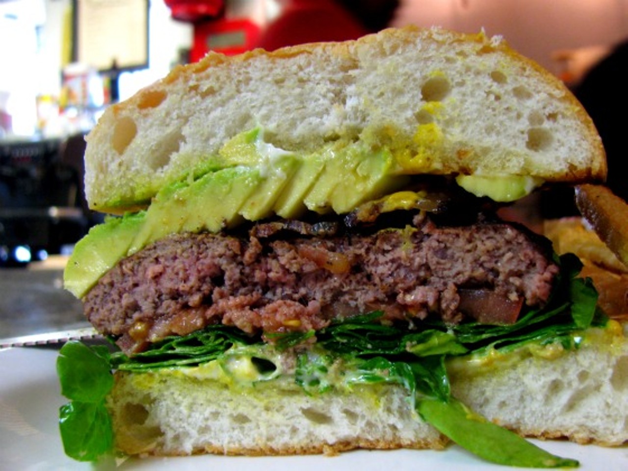 Source: Houston
Where: Facundo 
At Facundo, an unlikely restaurant tucked into a car wash serves a mean burger at lunch, topped with applewood bacon and avocado. credit: 
Read more on Houston Press: Burger and Oil Change at Facundo Cafe
