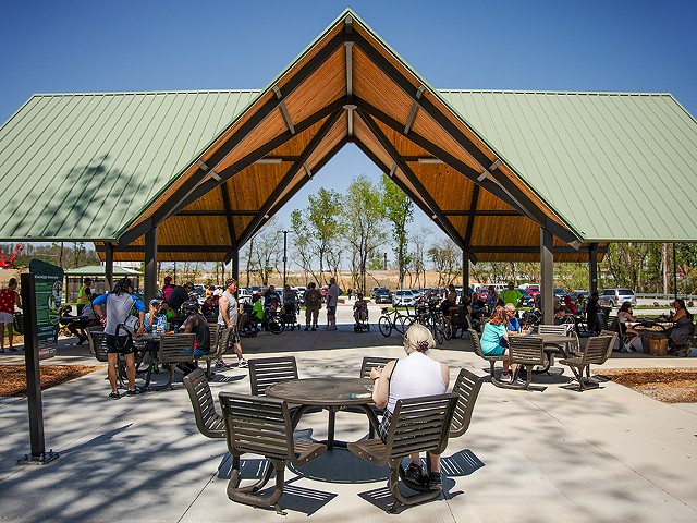 Crowds gather under the new picnic pavilion on Sunday April 14, 2024, at the Chain of Rocks Park.