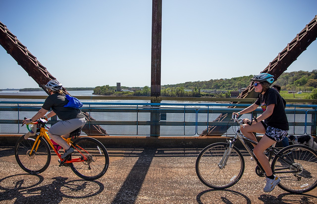 Cyclists ride across the Chain of Rocks Bridge on Sunday, April 14, 2024.