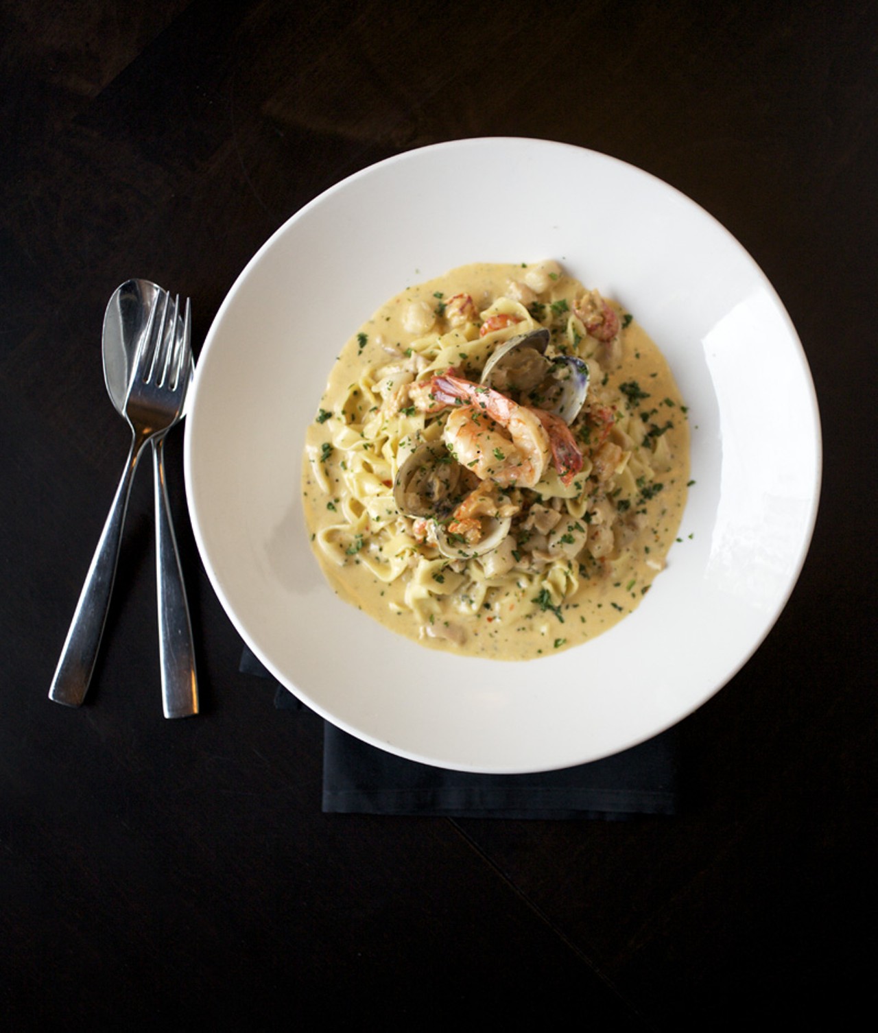 The Seafood Pasta Suzanne, named for Charlie's daughter, is fresh tagliatelle pasta, shrimp, scallops, clams, langostinos and three-pepper cream.