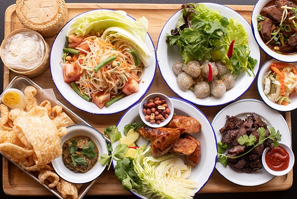 A selection of items from Chiang Mai: som tum, sakoo sai moo, gaeng hung lay, kab moo, sai oua and nua sawaan.