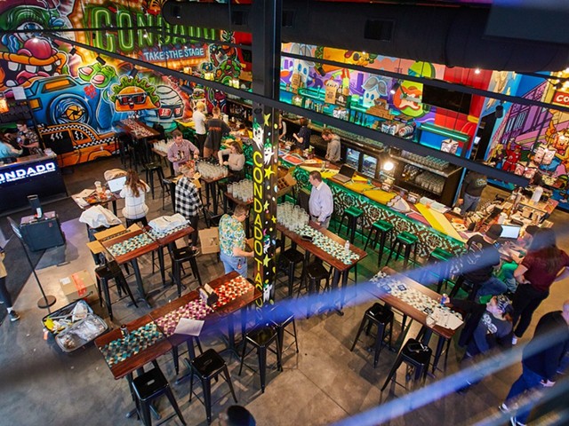 The colorful, open dining room at Condado Tacos.