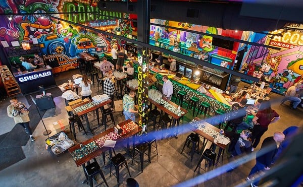The colorful, open dining room at Condado Tacos.