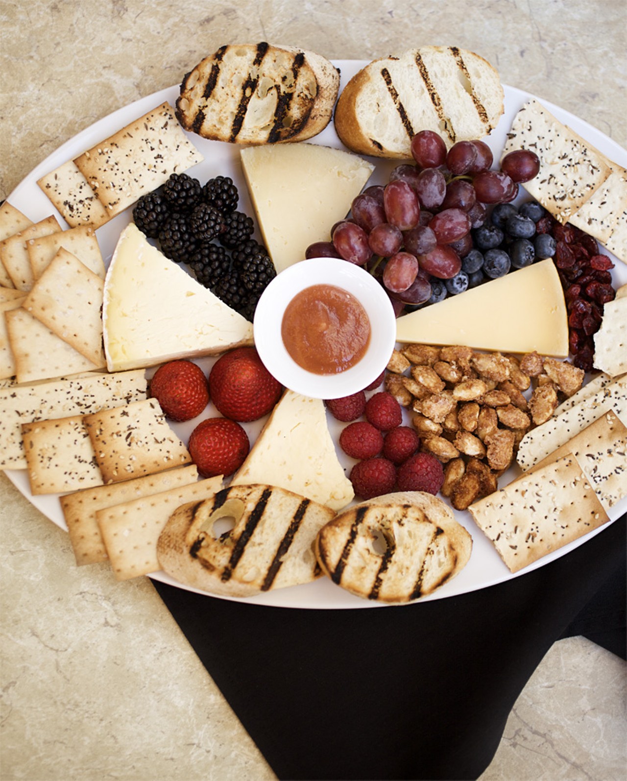 Also from the appetizer menu comes the Imported and Domestic Cheese Plate, including candied nuts, fresh and dried fruits, quince paste and grilled bread.