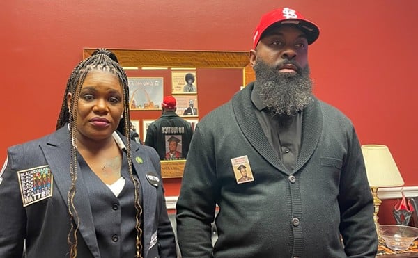 Cori Bush before the State of the Union address with her guest, Michael Brown Sr., whose son Michael Brown was killed by police.