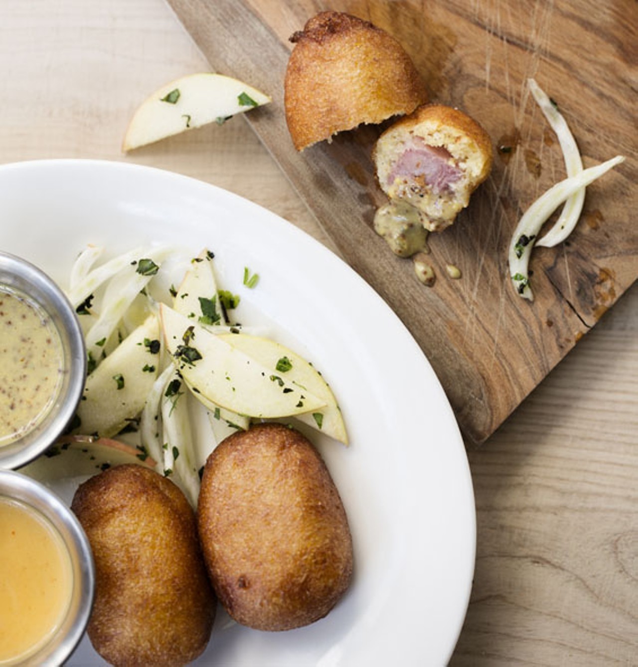 "Mortadella Corndogs" are made with moretti beer Cheese, jalapeno honey mustard and a basil-fennel salad.