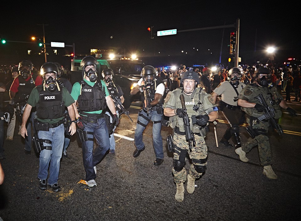 Images of heavily armed police six years ago in Ferguson shocked the country. Now, similar scenes are playing out in every major U.S. city.