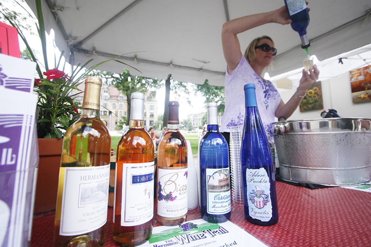 Patty Held, president of the Hermann Wine Trail, pours a sample of wine. The Hermann Wine Trail is a collection of 7 wineries along 20 miles of the Missouri River between Hermann and New Haven.