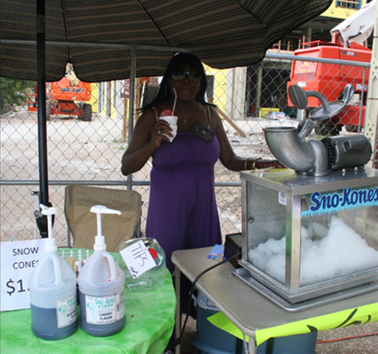 Tabatha Pikes, Owner of Tabu Boutique, offered up dollar snowcones outside and discounts inside of her shop.