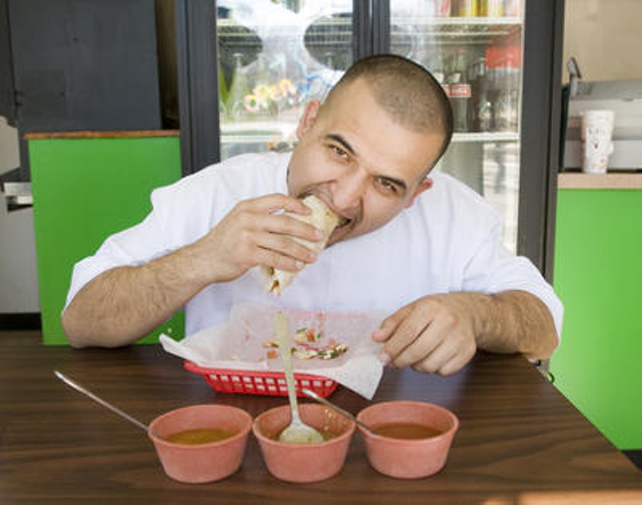 Juan Villa, owner of Taqueria El Jalape&ntilde;o in St. Ann, samples the goods in our Back of the House slide show.