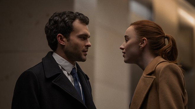 Luke (Alden Ehrenreich) and Emily (Phoebe Dynevor) are in love — but work is a complication.