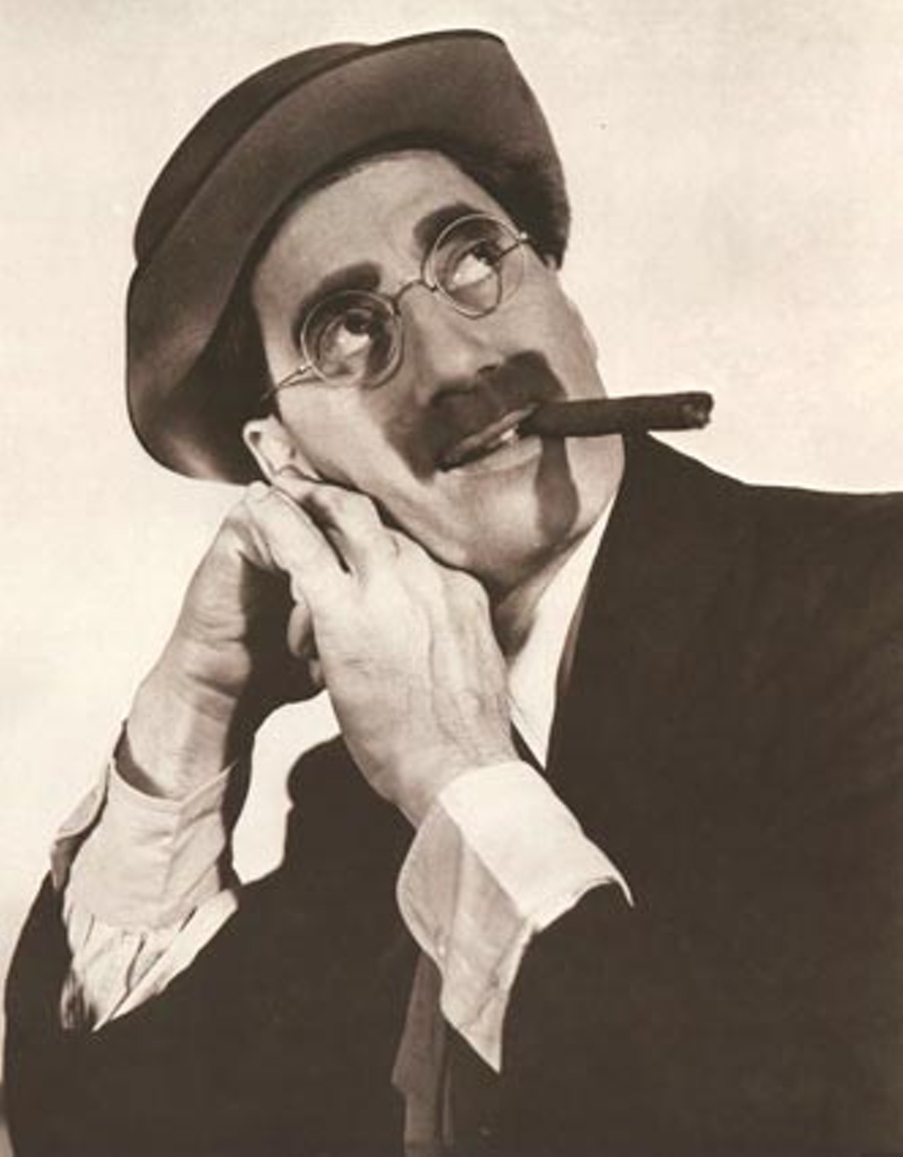 Groucho Marx (1890-1977) was most distinctive for his mustache, eyebrows and glasses.