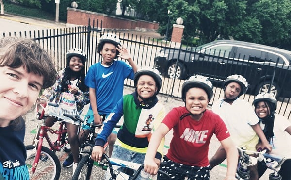 Author Evie Hemphill with St. Louis BWorks Earn-a-Bike graduates at Patrick Henry Downtown Academy Elementary School.