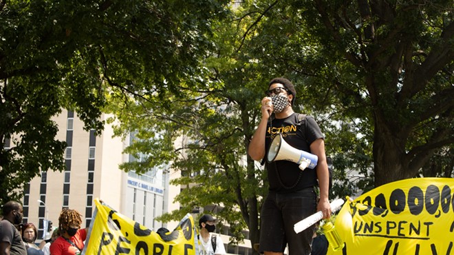 Activist and organizer Kennard Williams speaks to a crowd of about 40 protesters at Poelker Park on August 2, 2021. Williams and the crowd gathered to protest the end of the federal eviction moratorium.