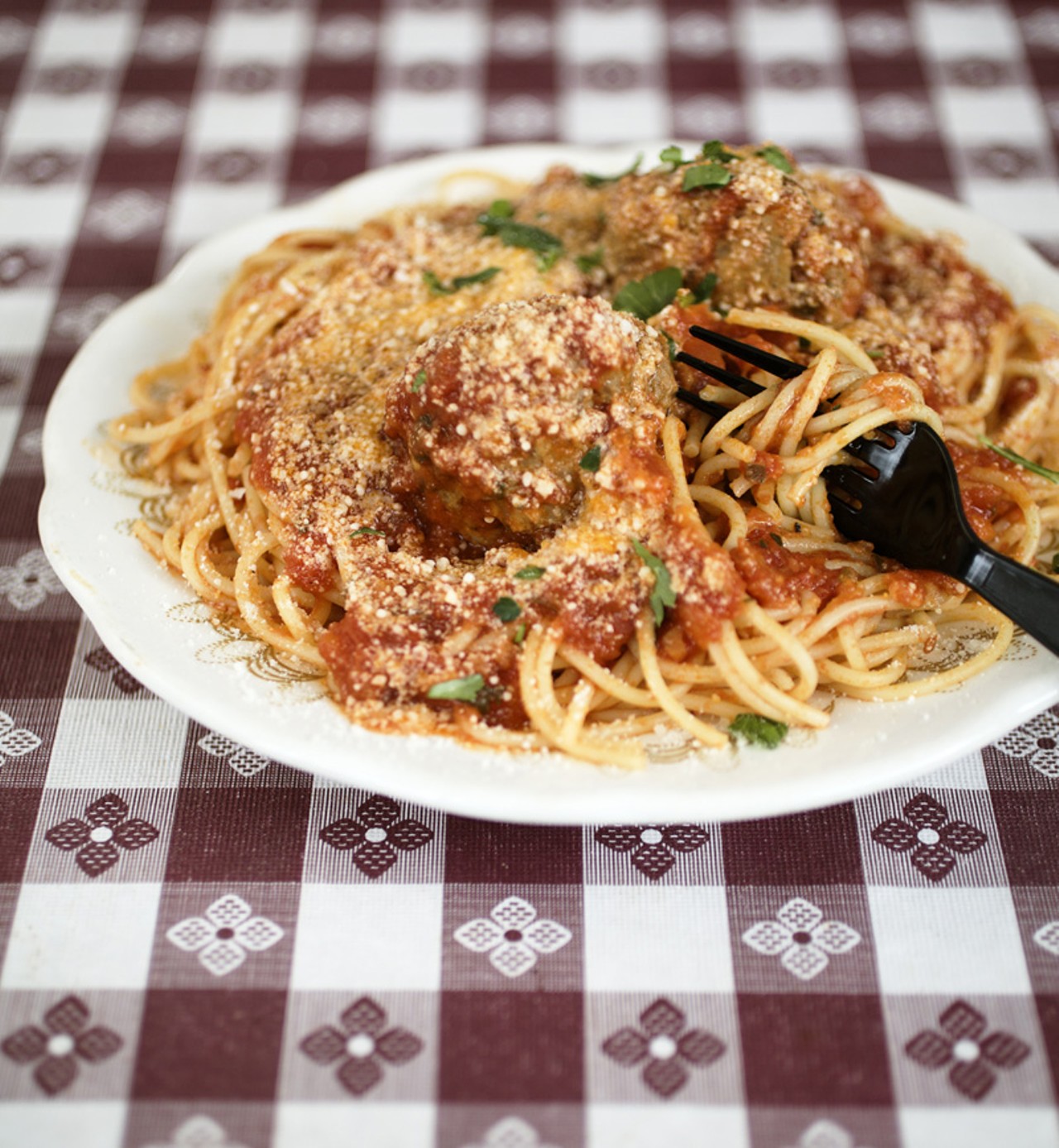 Spaghetti and meatballs, served with a marinara sauce. Both the marinara and meat sauces at Filomena's are prepared with imported San Marzano Tomatoes and extra virgin olive oil.