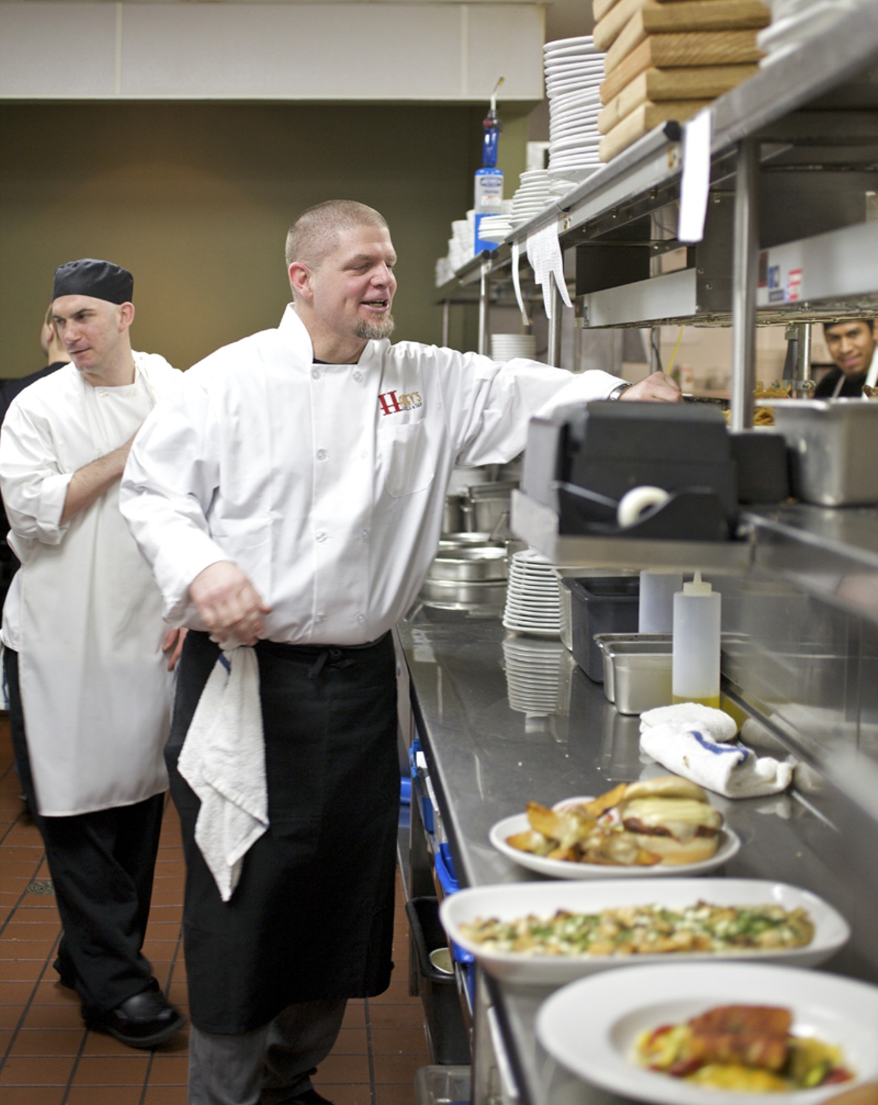 1.Chef restaurateur Jeff Constance (right) and executive chef Chad Vanderleest (left) handling the lunch crowd last week.