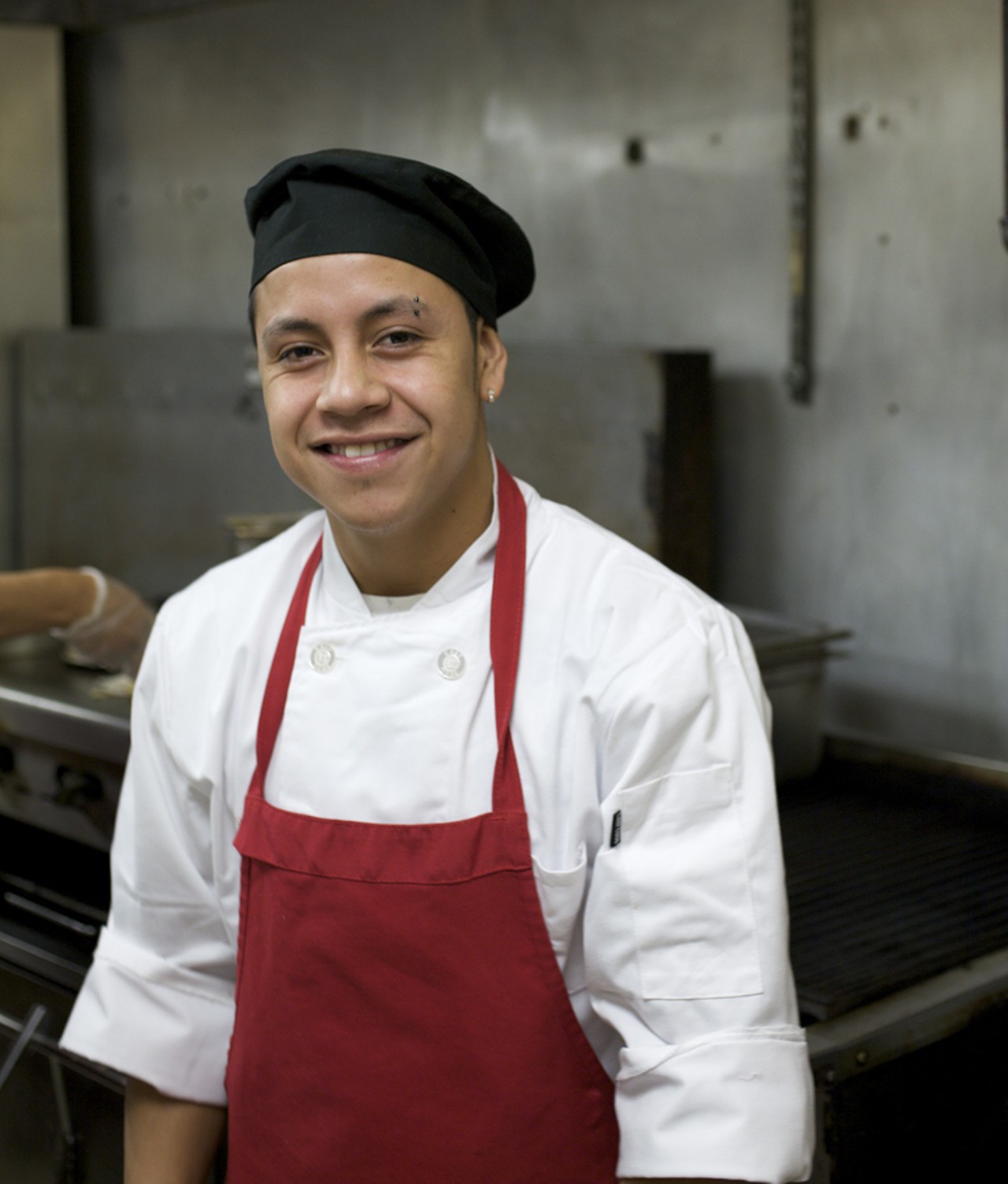 Line cook Mauri Rivera in the kitchen at Las Palmas in Maplewood.