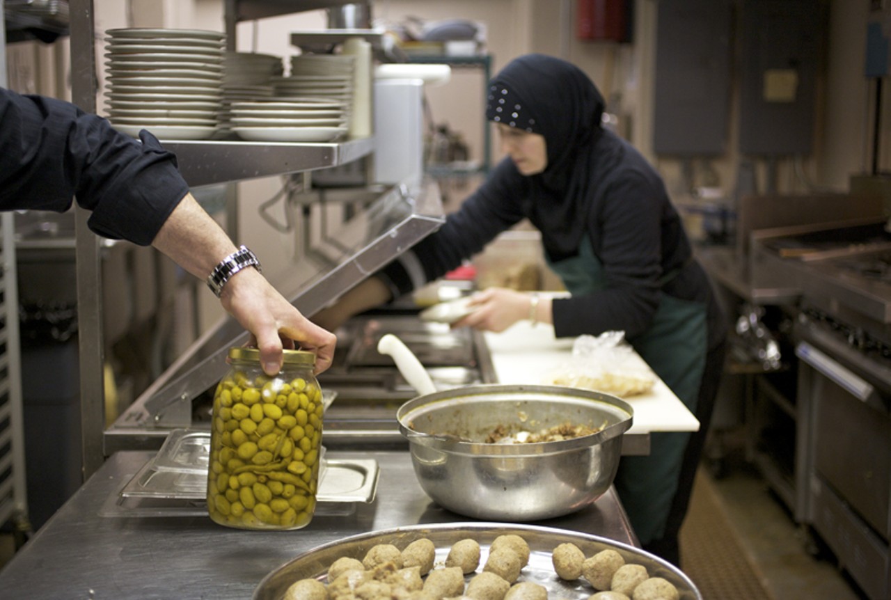In the kitchen at the Vine the Mohsen&rsquo;s work side-by-side.