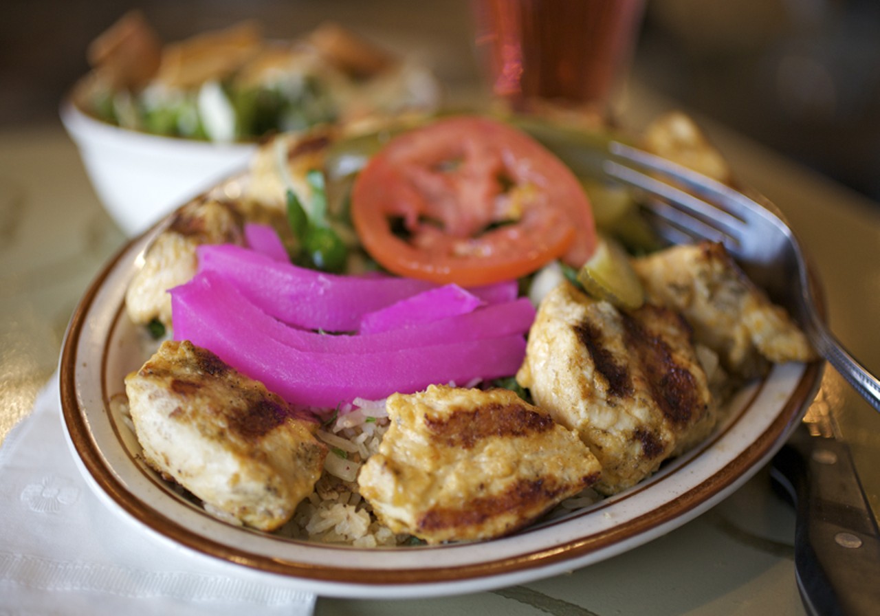 The chicken kabob entre&eacute; is seasoned, grilled chicken breast and is served with rice, and of course, pickled turnips and tomato.